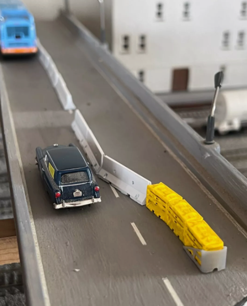 Traffic Crash Barrier Sled and Construction Jersey Barriers