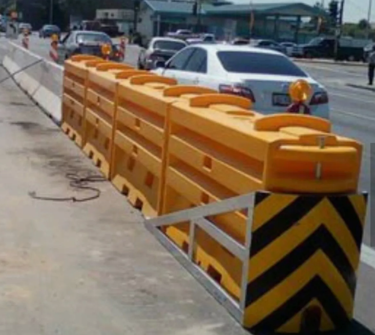 Traffic Crash Barrier Sled and Construction Jersey Barriers