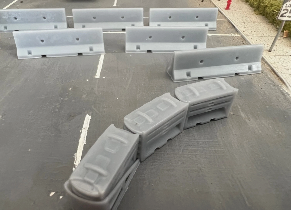 Traffic Crash Barrier Sled and Construction Jersey Barriers